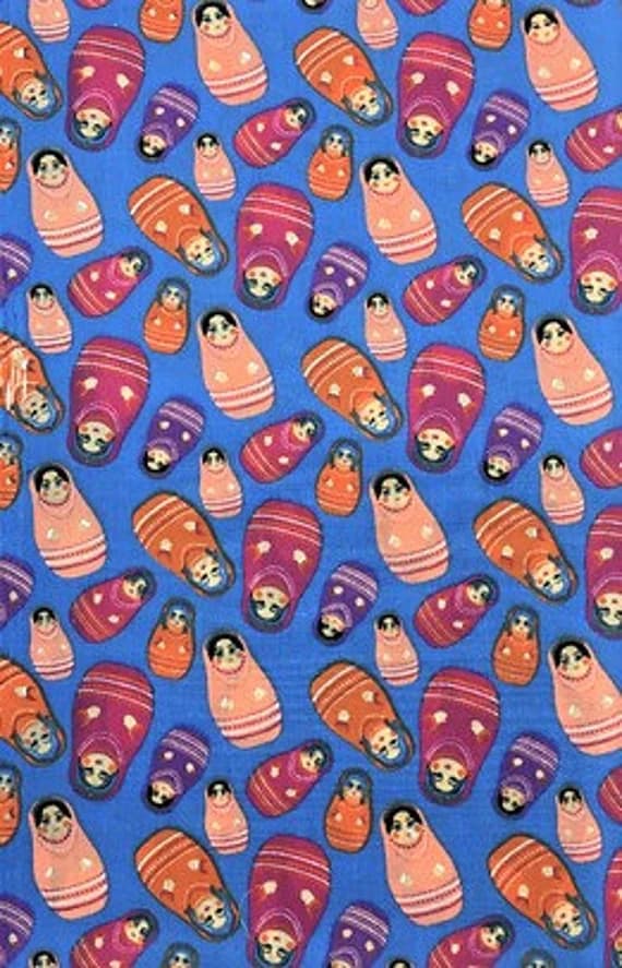 blue cotton fabric - Nesting Dolls on Blue - Poly/Cotton Broadcloth Fabric