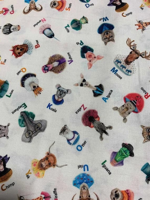 beige cotton fabric - Animals Alphabet on Beige - Zootopia A-Z - by Rachel Neiman for Elizabeth's Studio