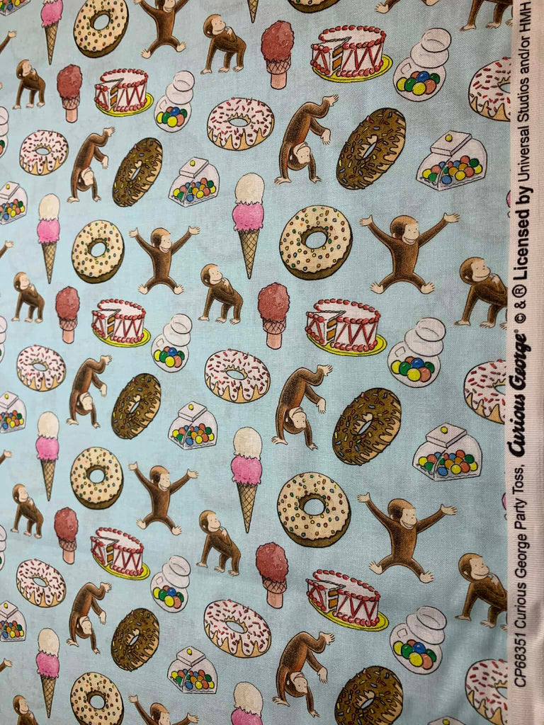 Curious George Party Toss on Blue Cotton Fabric